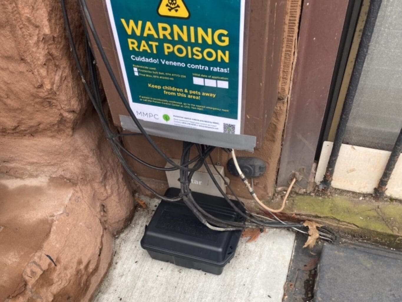 MMPC rat bait station and warning sign